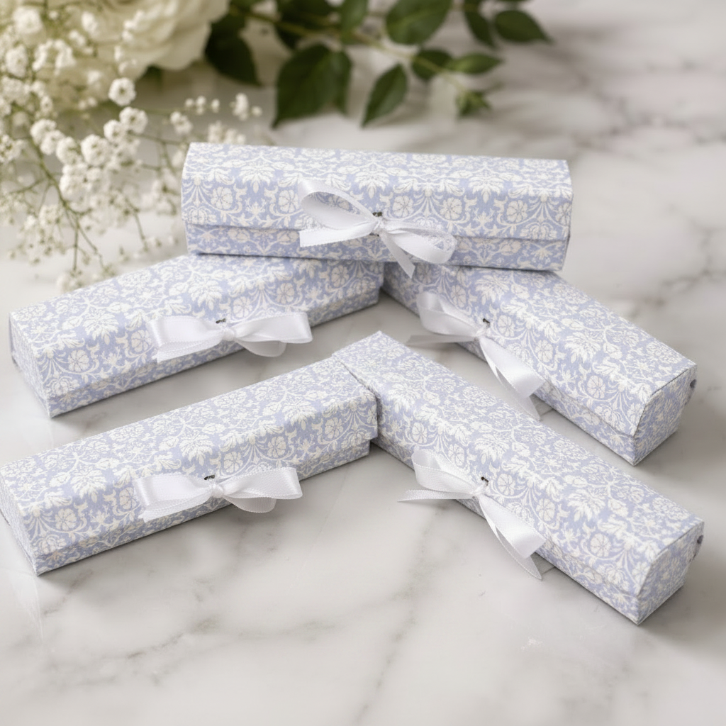 Pale blue damask wax melt gift boxes with white satin ribbon, white roses and gypsophila – Lux & Lustre